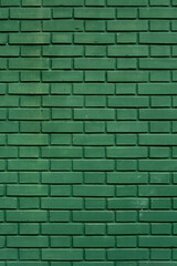 Dark green brick wall vertical background.