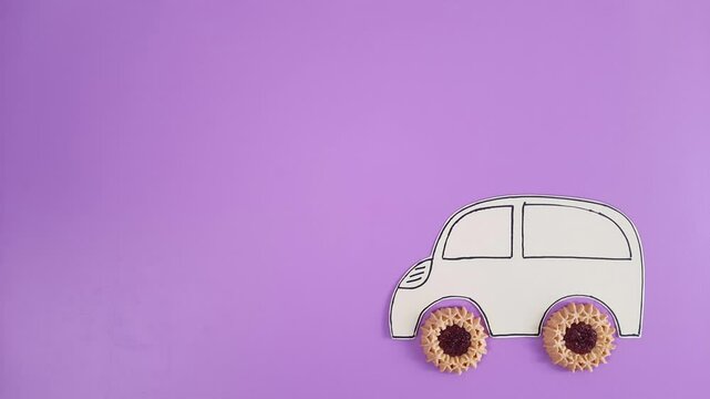 Food delivery. Video template for catering delivery service with a funny retro car with cookies wheels and space to insert text, advertising, design, offer on a purple background.