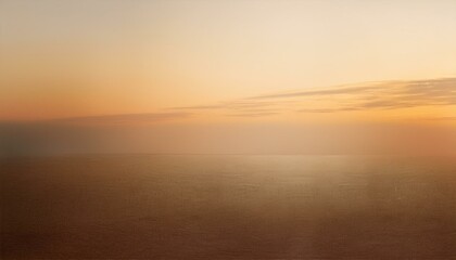 Obraz premium オレンジ色の光が広がる淡いベージュの背景、心地よい暖かさが漂う穏やかな風景
