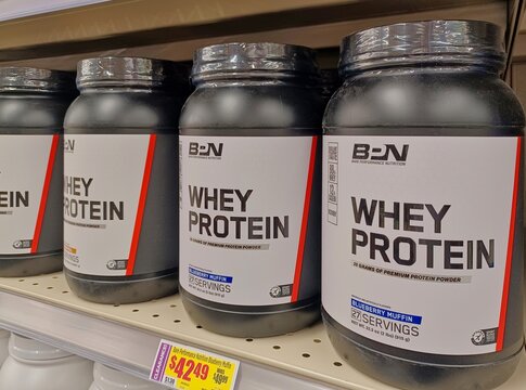 Whey protein powder containers bodybuilding muscle Bare Performance Nutrition Houston TX USA 09-09-2024.