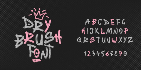 Fototapeta premium Hand drawn dry brush font. Youthful street style marker graffiti alphabet. Vector typographic design, halftone texture background