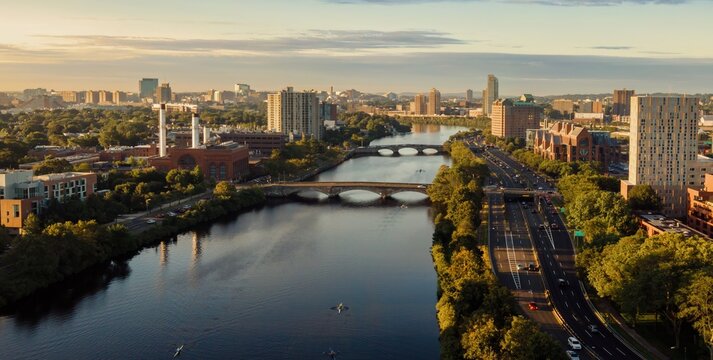Charles River and monring traffic on the Soldiers Field Road at sunrise, Cambridge, Massachusetts, United States.