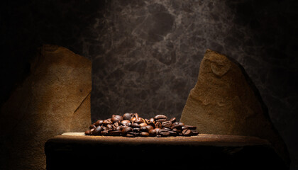 natural brown stones and coffee beans for the podium background of the presentation of products...
