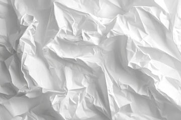 Obraz premium Textured crumpled white paper resting on a minimalistic surface, highlighting intricate folds and shadows in soft lighting