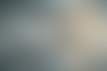 Abstract noisy grainy backdrop featuring a soft gradient blending colors for artistic compositions or designs