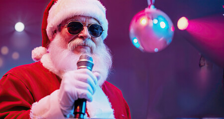 Funny Santa Claus sings karaoke