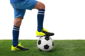 Football player with soccer ball on artificial grass against white background, closeup