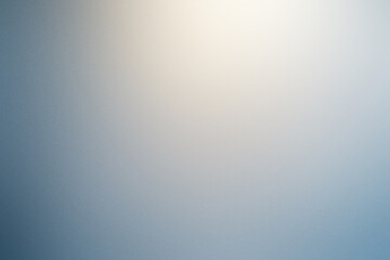 A blurry blue background with a white sun in the background. Noisy backdrop with grain