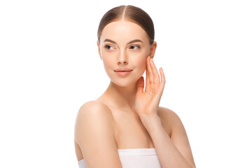 Beauty woman with hand near face looking away. Skincare or cosmetic