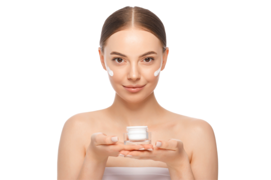 Portrait of young woman holding face cream jar with both hands