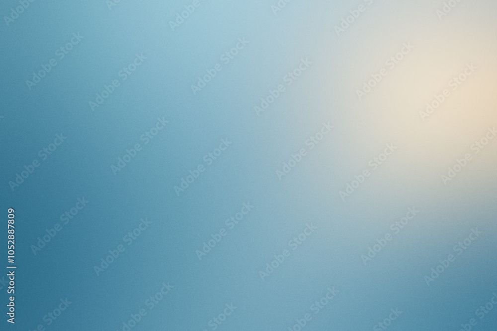 Poster abstract representation of noisy grainy texture with a soft gradient blending in shades of blue and 