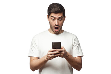 Portrait of young man impressed by media content from web on display of the phone. Shock content concept