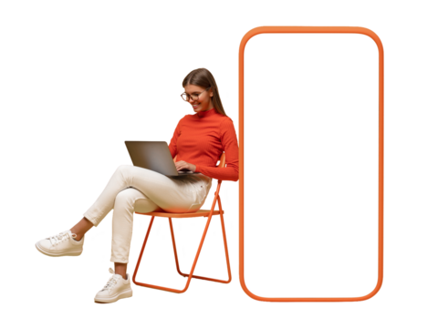 Happy young woman sitting with laptop on chair near blank screen of huge phone, mockup for app