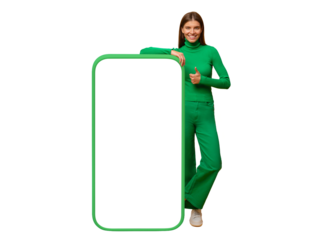 Happy young woman standing and showing blank screen of huge phone, mock up for your app