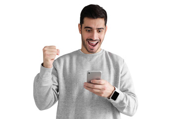 Handsome excited man winning a bet and looking at smart phone with mobile app. Winner concept