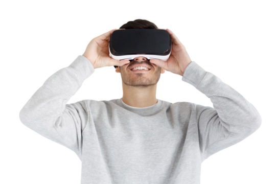 VR concept. Close-up portrait of smiling young man in virtual reality glasses - Powered by Adobe