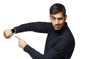 It's time to act! Young man pointing at watch with impatience as if asking to hurry up