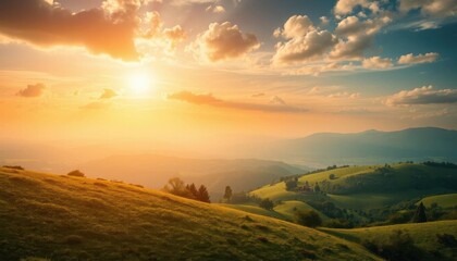 Fototapeta premium a view of a beautiful sunset over a green valley with hills