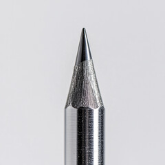 sharp silver pencil tip close up macro shot  studio light  isolated on white background