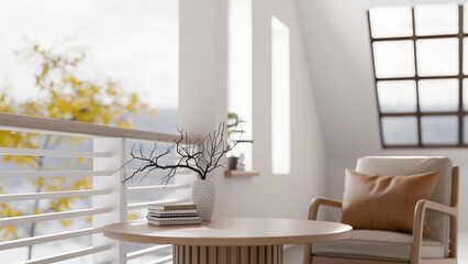 Fototapeta premium A comfortable contemporary relaxation area featuring a round wooden coffee table and an armchair.