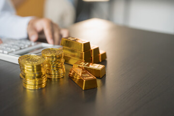 Gold Trading business man hand offering gold Investment in gold mining company or Trading gold on the stock exchange Rising gold prices.