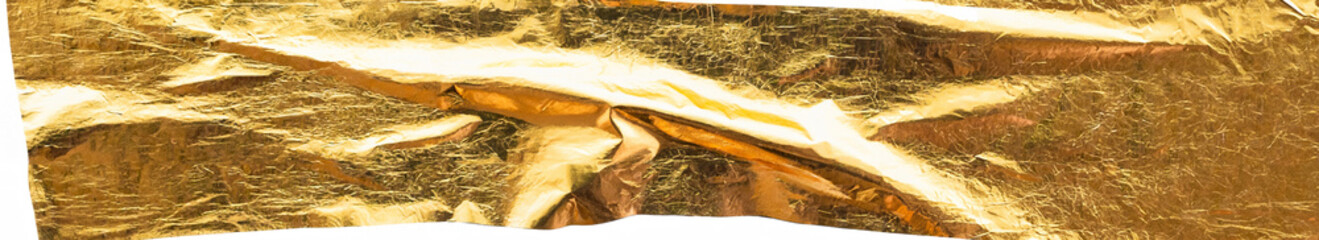 Close-up of crumpled gold foil texture with reflective, irregular patterns, ideal for backgrounds.