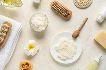 Composition with natural body scrub, cosmetic products and bath supplies on light background