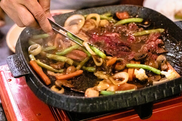 Close up of Beef steak frying in restaurant.