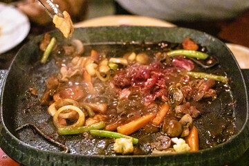 Close up of Beef steak frying in restaurant.