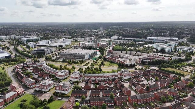 Aerial footage of the center of Hatfield town on a sunny day in Hertfordshire county, England, UK