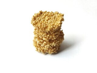 Rengginang or Indonesian traditional cracker made from glutinous rice, isolated on white background 