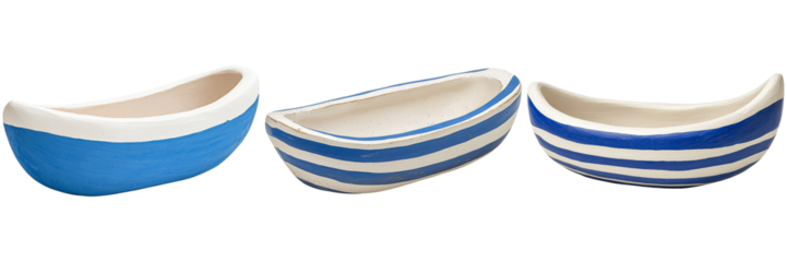 Three decorative ceramic boats in blue and white colors, showcasing a nautical theme with simple yet elegant design.