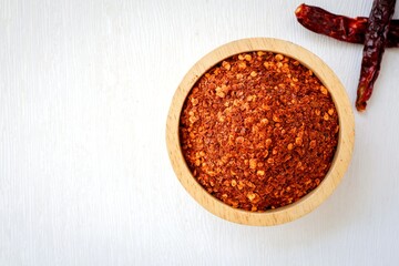 Dried chili pepper, cayenne pepper on white background, top view food table