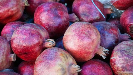 Close Up of Red Pomegranates at Market