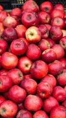 Red Apples at a Market Stall