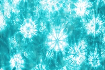 A vibrant tie-dye pattern in shades of turquoise, featuring circular designs that evoke a sense of creativity and fun.