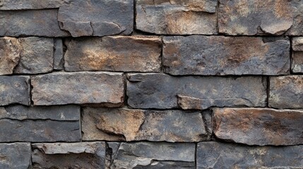 Fototapeta premium Weathered clay brick wall texture with rugged details