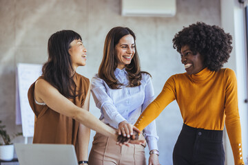 Diverse Female Team Collaborating in Office Environment