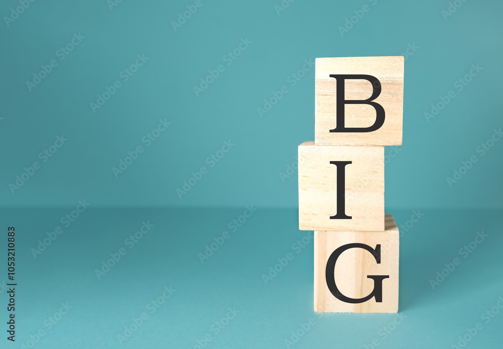Poster the blocks are arranged in a way that they spell out the word big