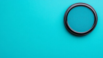 Blue Filter on Teal Background: A circular blue filter sits in the upper right corner of a vibrant teal background, ready to enhance your photography.
