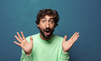 feeling happy, excited, surprised or shocked, smiling and astonished at something unbelievable