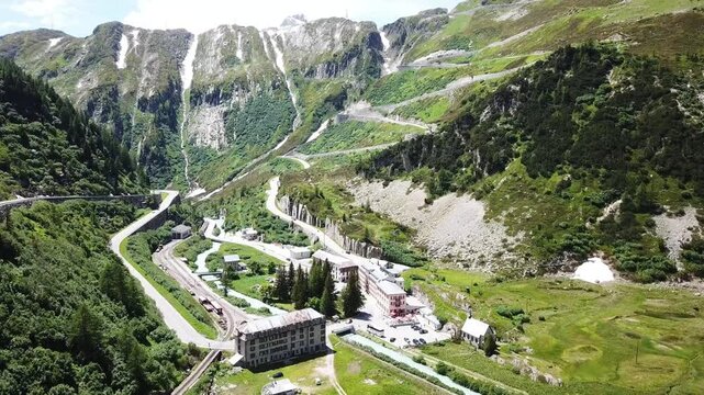 Aerial view of the cute Gletsch, Valais, around its hills in Switzerland.