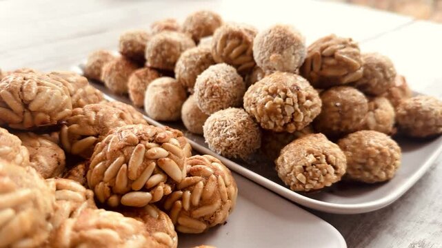 Panellets baked on a white background.