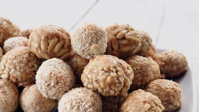 Panellets baked on a white background.