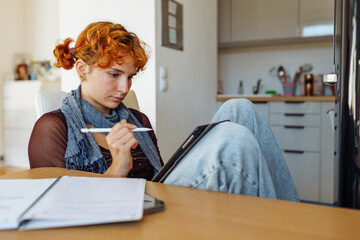 Woman using tablet, e-learning