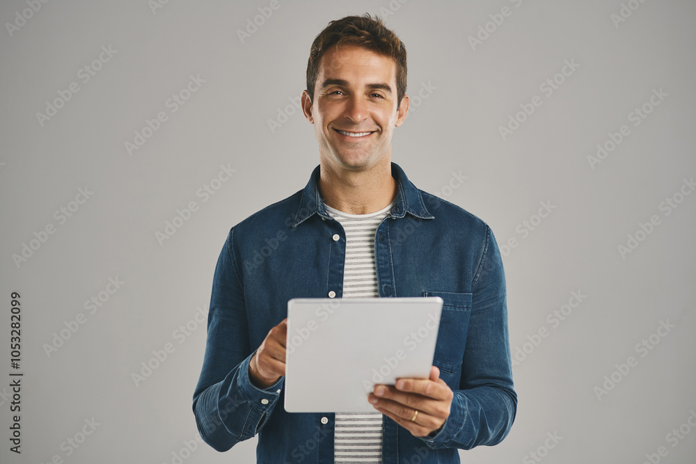 Poster portrait, smile and tablet with man in studio isolated on gray background for app download or update