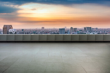 Empty rooftop balcony with view of modern building skyscrapers and futuristic architecture with...