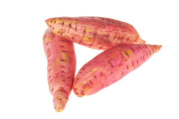 Ripe sweet potatoes on a white background