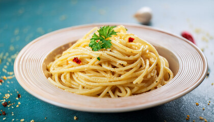 Close-up of spaghetti aglio e olio with sauteed garlic, chili flakes, parsley. Tasty Italian food.