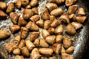 Pan-fried chicken hearts in butter, with a rich golden texture. Perfect for hearty, flavorful, and protein-packed meals.